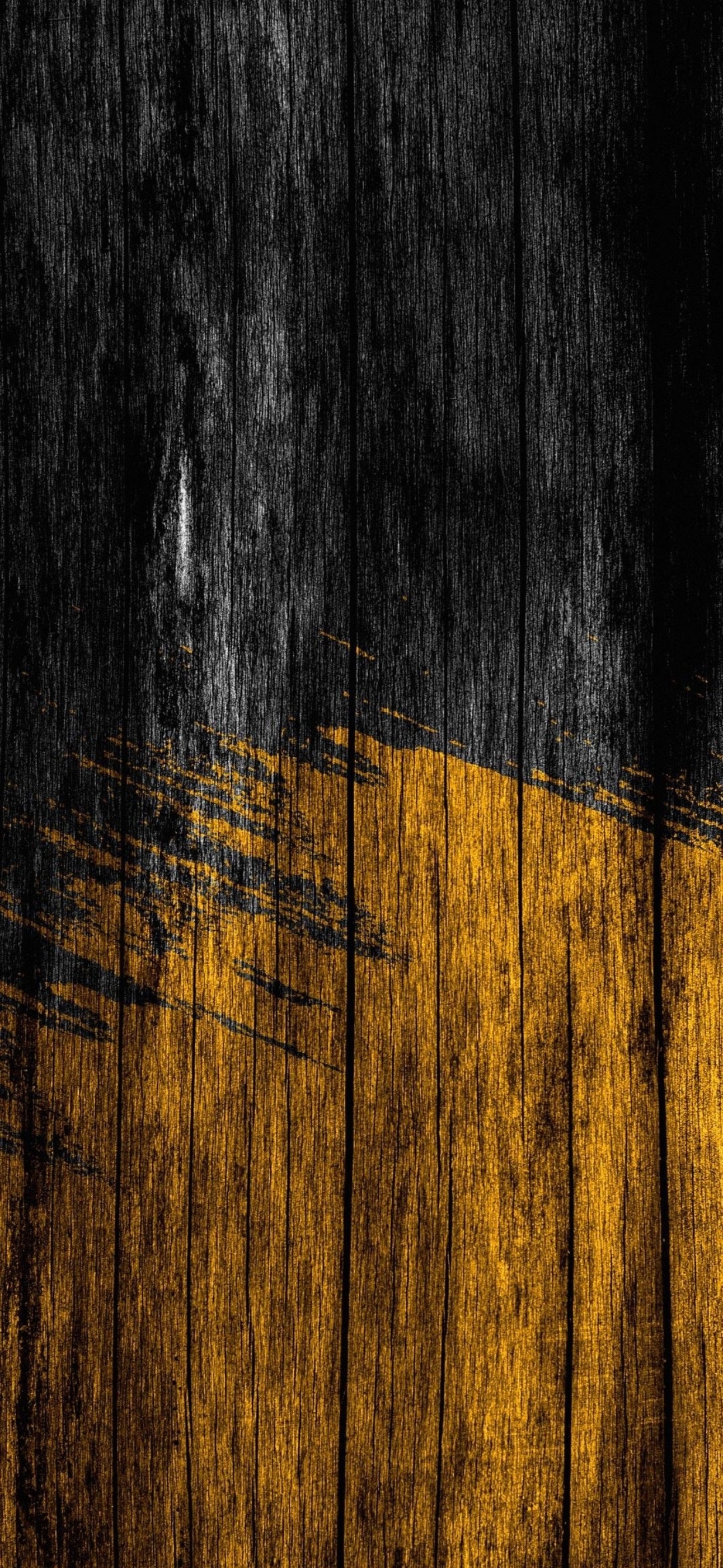 Dark textured wooden surface with orange and black brush strokes for an abstract look | 4K Wallpaper for Mobile