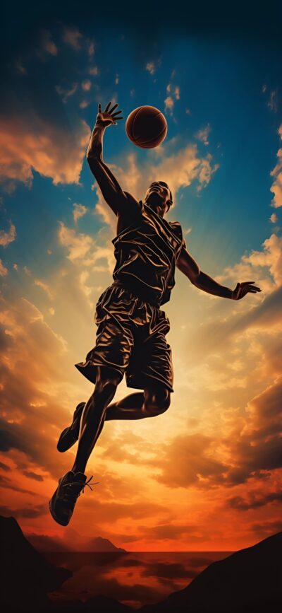 Silhouetted basketball player leaping against a vibrant sky, evoking achievement. | 4K Wallpaper for Mobile