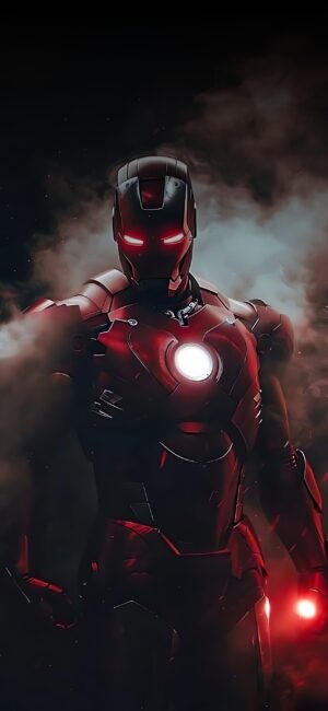 Iron Man in his iconic suit with glowing elements against a smoky, dramatic background | 4K Wallpaper for Mobile