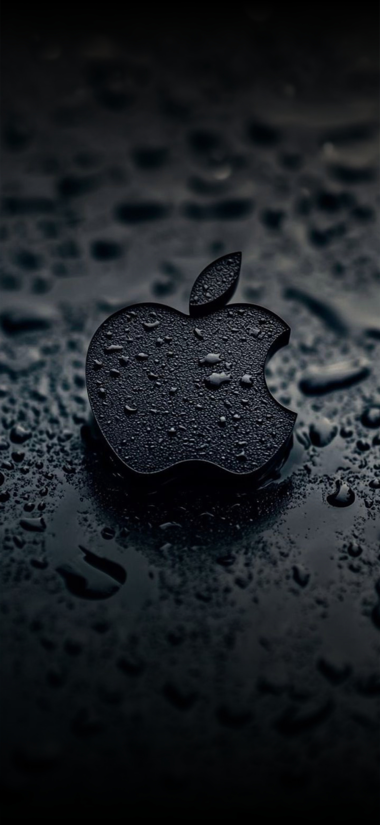 Apple logo with water droplets on a dark, sleek background. Perfect for an elegant mobile screen. | 4K Wallpaper for Mobile