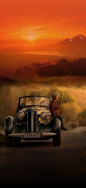 Vintage car at sunset with a child on bumper, orange skies, rolling hills, and birds | 4K Wallpaper for Mobile