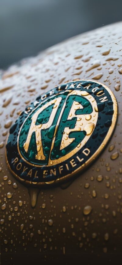 Royal Enfield logo in green & gold with water droplets on brown background | 4K Wallpaper for Mobile