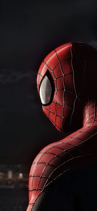 Close-up Spider-Man in iconic red and blue suit with web patterns against a dark background | 4K Wallpaper for Mobile