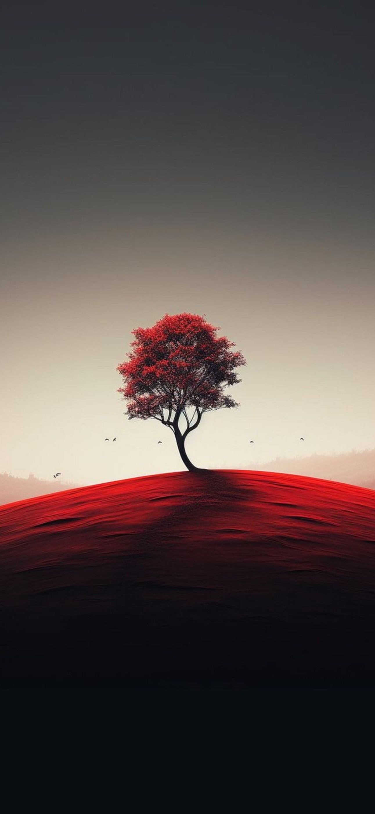 Solitary tree with red leaves on a hill, moody sky, and birds in the background. Serene scene in red, black, gray. | 4K Wallpaper for Mobile