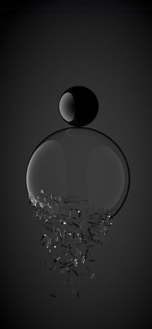 Minimally abstract design with a black sphere on a shattering glass sphere against a dark backdrop | 4K Wallpaper for Mobile