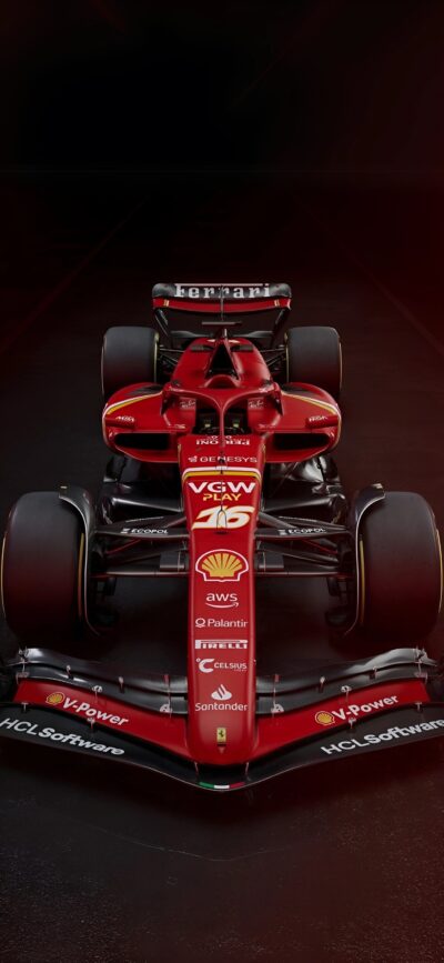 Red Ferrari F1 car with sponsor logos like Shell and Pirelli, highlighting its sleek design for high-speed racing | 4K Wallpaper for Mobile