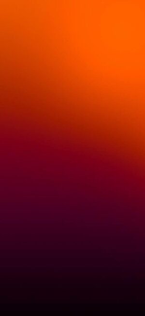 Vibrant gradient 4K wallpaper for mobile featuring a red to orange transition, creating a warm and energetic abstract design.