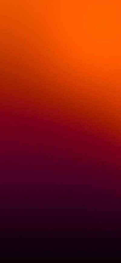 Vibrant gradient 4K wallpaper for mobile featuring a red to orange transition, creating a warm and energetic abstract design.