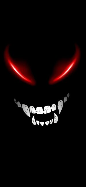 Sinister face with glowing red eyes & sharp grin in darkness creates an eerie feel. Perfect for horror fans. | 4K Wallpaper for Mobile