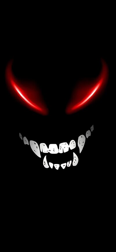 Sinister face with glowing red eyes & sharp grin in darkness creates an eerie feel. Perfect for horror fans. | 4K Wallpaper for Mobile