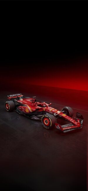 Sleek red Ferrari F1 car on gradient backdrop, emphasizing aerodynamic design and branding. Perfect for motorsport fans | 4K Wallpaper for Mobile