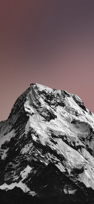 Black & white snow-capped mountain with gradient pink-purple sky. Majestic nature scene. | 4K Wallpaper for Mobile