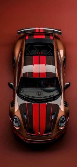 Sleek sports car with red/black stripes and spoiler set against a red backdrop | 4K Wallpaper for Mobile