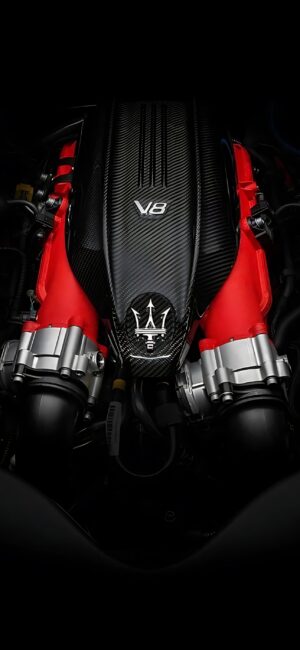 Maserati V8 engine close-up wallpaper in red and black tones for mobile | 4K Wallpaper