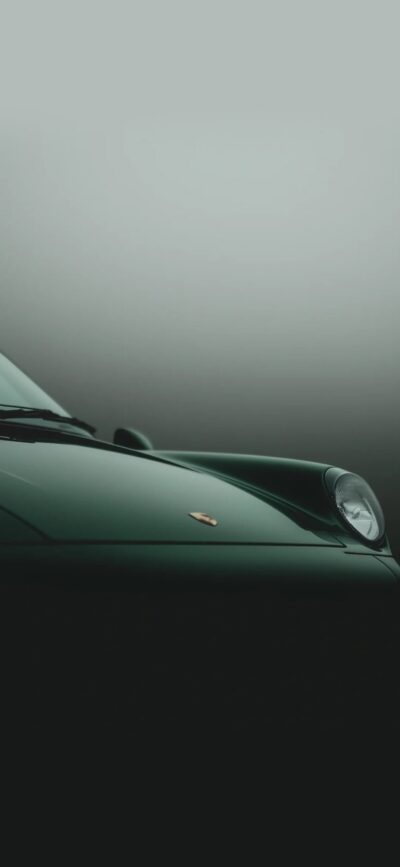 Green sports car front view with sleek design and elegant curves for mobile | 4K Wallpaper | Green, black, gray colors.