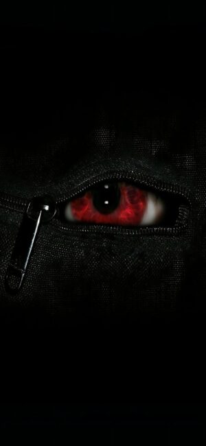 Intense red eye through a zipper on dark background, evoking mystery and secrets | Black and Red | 4K Wallpaper for Mobile