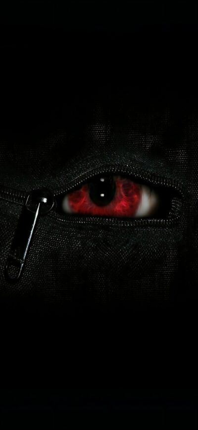 Intense red eye through a zipper on dark background, evoking mystery and secrets | Black and Red | 4K Wallpaper for Mobile