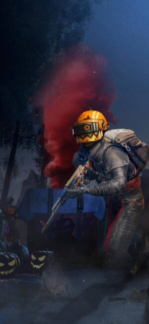 PUBG player in armored suit with orange helmet, red smoke, and jack-o'-lanterns. Halloween theme. | 4K Wallpaper for Mobile