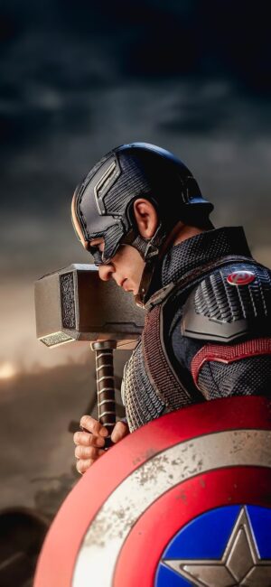 Captain America wielding Mjolnir, showcasing superhero strength and unity | Grey, Red, Blue | 8K Wallpaper for Mobile