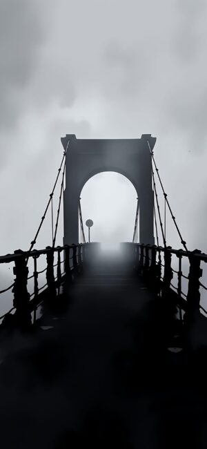 Moody suspension bridge in fog against a gray, overcast sky | 4K Wallpaper | for Mobile | Gray & Black tones | Mystery & Solitude