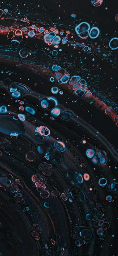 Abstract swirling blue and red bubbles on dark background, cosmic or underwater effect | 4K Wallpaper for Mobile