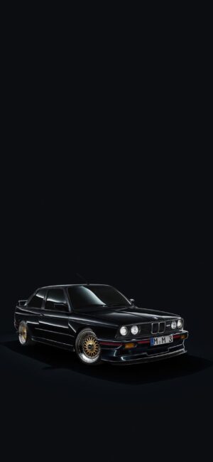 Vintage BMW car on a black background with polished metal accents and headlights | 4K Wallpaper for Mobile | Black, Gold