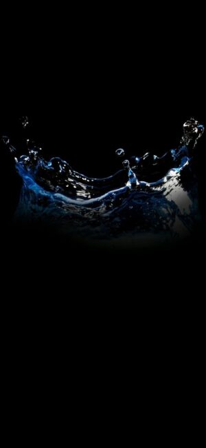 Dynamic water splash against a dark background, emphasizing fluid motion and water droplets. | 4K Wallpaper for Mobile