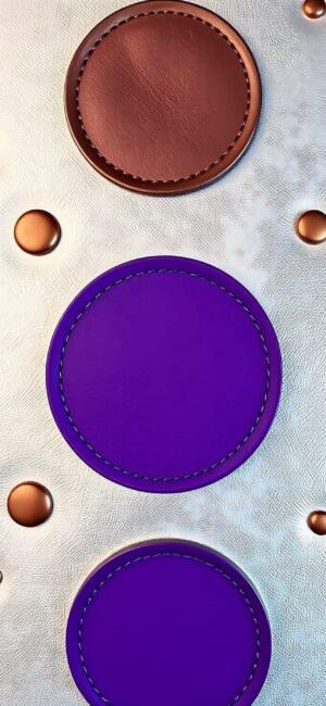 Textured leather pattern with stitched circular designs in brown and purple hues. Luxurious embossed background | 4K Wallpaper for Mobile