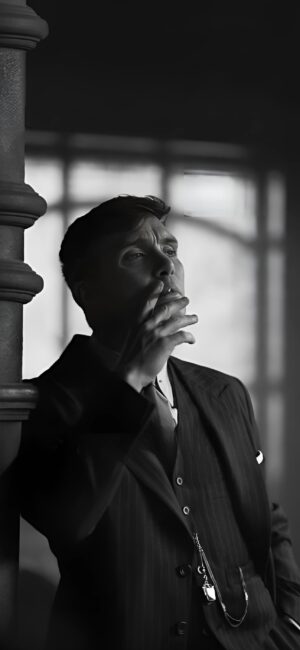 Person in a classic suit by window; black and white. Vintage/noir style | 4K Wallpaper, for Mobile