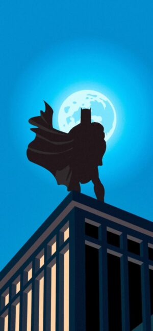 Batman silhouette on a rooftop under a bright moonlit sky, capturing his dark vigil | Black & Blue | 4K Wallpaper, for Mobile