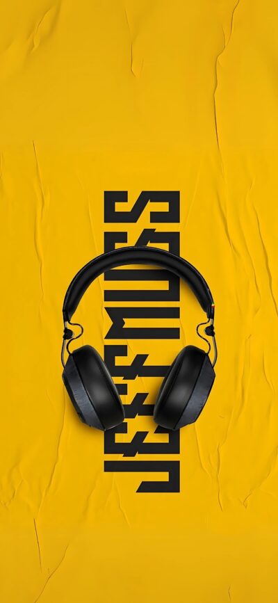 Black headphones on textured yellow background with stylized text design | 4K Wallpaper for Mobile