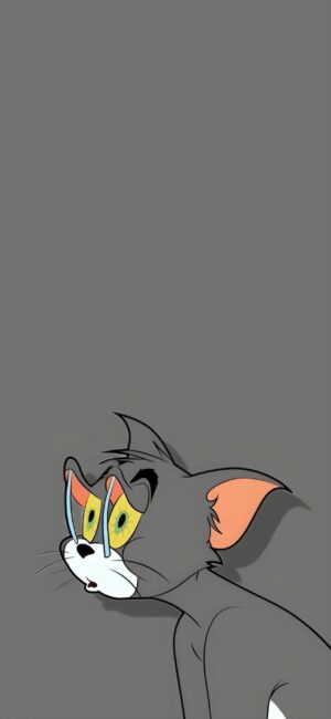 Surprised Tom from "Tom & Jerry" on gray background with vivid yellow eyes and red ears | 4K Wallpaper for Mobile