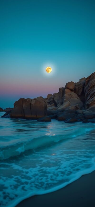 Serene dusk beach scene with waves against rocks, full moon, teal-pink sky. Peaceful coastal view | 4K Wallpaper, for Mobile