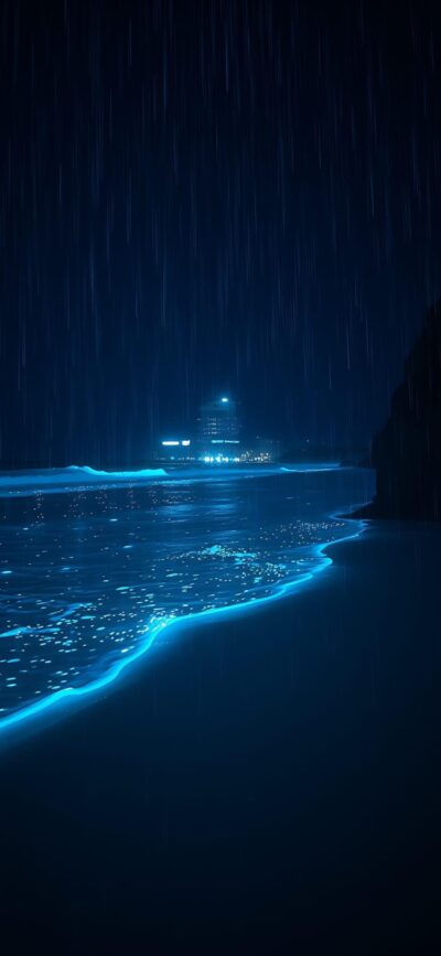 Glowing ocean shoreline under rainfall at night with blue waves and distant lights for intrigue | 4K Wallpaper for Mobile | Fantasy