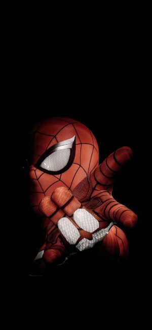 Spiderman in dynamic pose on black background, red-blue costume with white eye lenses | 4K Wallpaper for Mobile