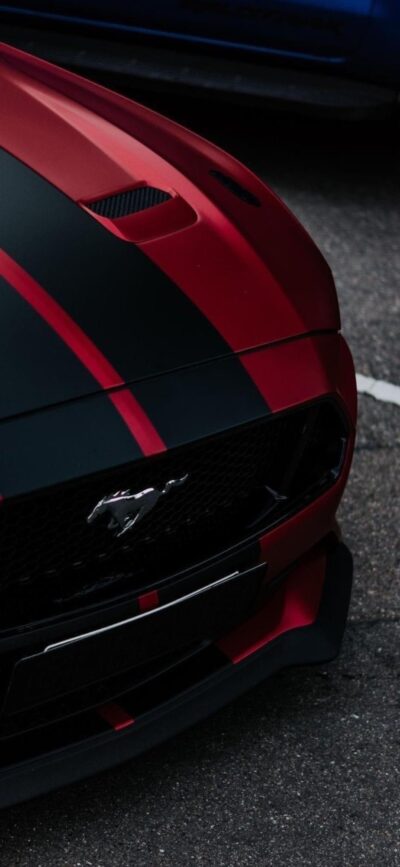 Ford Mustang front view with black and red stripes, iconic grille emblem, sporty design in red, black, gray | 4K Wallpaper for Mobile