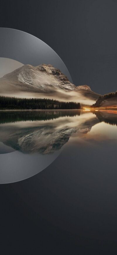 Serene mountain reflected in a calm lake with abstract circles; gray, brown, black tones | 4K Wallpaper for Mobile