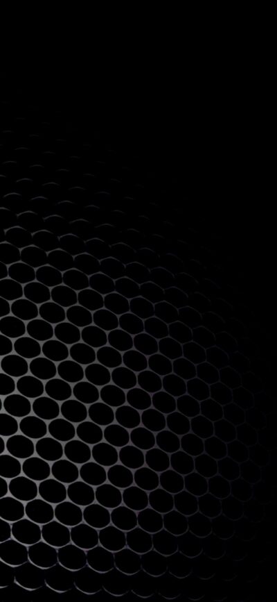 Hexagonal pattern on dark background with subtle lighting for a textured, futuristic look | 4K Wallpaper for Mobile