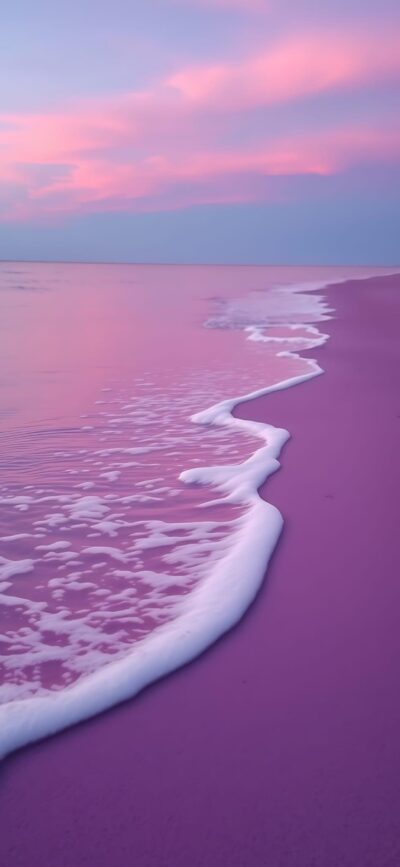 Serene beach scene with pink and purple sky; tranquil waves and soft pink sand | 4K Wallpaper for Mobile