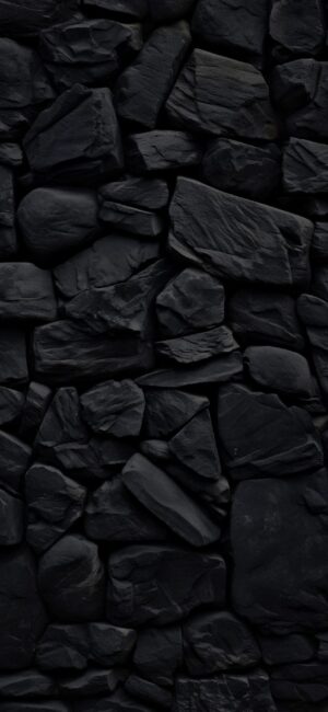 Textured dark stones in an abstract, minimalistic pattern featuring black and grey tones. | 4K Wallpaper for Mobile