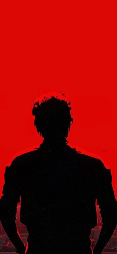 Silhouette against a bold red background creating a mysterious thrill. | 4K Wallpaper for Mobile | Red, Black, Mystery, Thriller