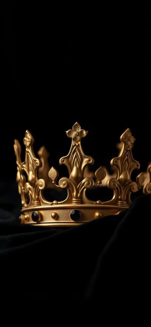 Golden crown with intricate details on a dark background, symbolizing royalty and luxury | 4K Wallpaper for Mobile