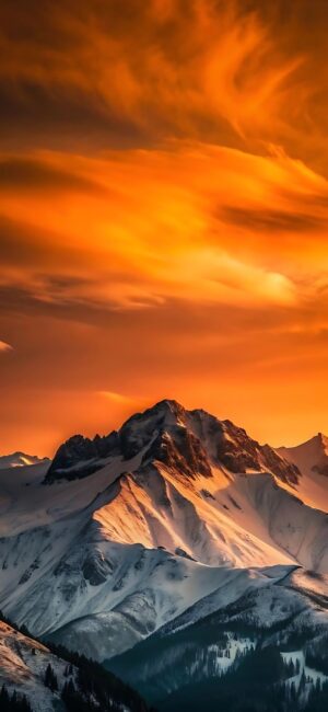 Mountain landscape with snow peak under orange sunset sky, vibrant colors | 4K Wallpaper for Mobile