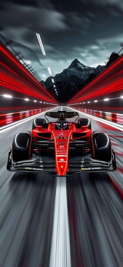 Red Formula 1 car racing through a futuristic tunnel with dramatic mountains and cloudy sky | 4K Wallpaper for Mobile