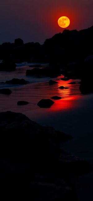 Stunning sunset seascape with sun reflection and rocky silhouettes | Red, black, orange hues | 4K Wallpaper for Mobile