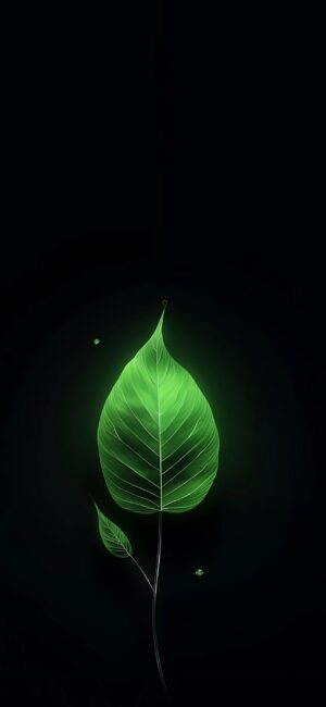 A glowing green leaf against a dark backdrop, highlighting its delicate structure for a calming and aesthetic design | 4K Wallpaper for Mobile