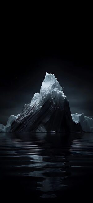 Iceberg in dark waters reflecting mystery and solitude | Black, White, Grey tones | 4K Wallpaper for Mobile