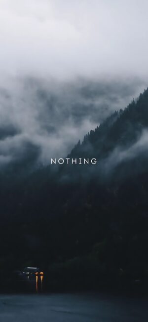 Misty mountain landscape with fog and "NOTHING" text, serene atmosphere. Black, grey, blue hues | 4K Wallpaper for Mobile