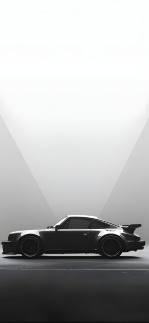 Black retro sports car in minimalist setting with modern lines | UHD Wallpaper for Mobile